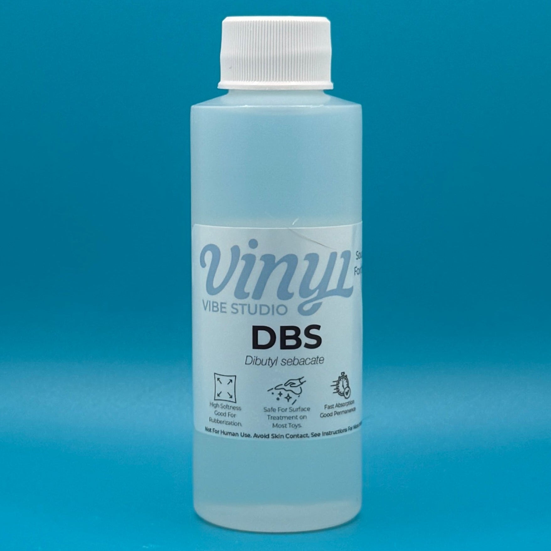 4 fl oz Bottle of DBS - PVC/ vinyl plasticizer & conditioner on a blue background